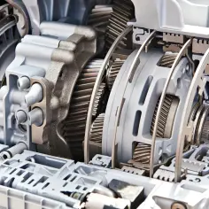 Przekładnia automatyczna z widocznymi elementami, w tym tarczami sprzęgłowymi, które odpowiadają na pytanie: czy skrzynia automatyczna ma sprzęgło.
