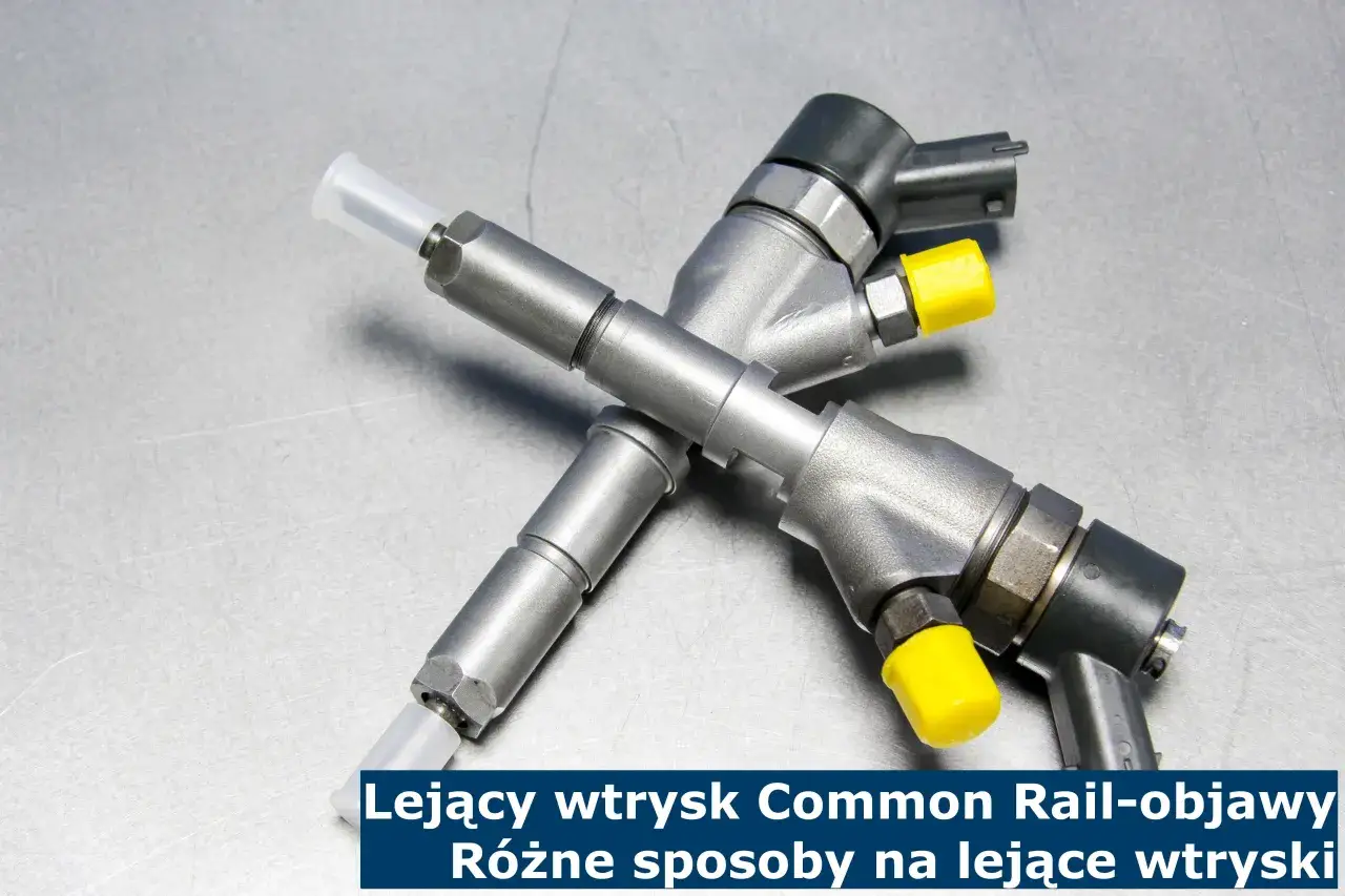 Dwa wtryski common rail leżące na metalowej powierzchni. Jeden z nich ma żółtą nakładkę.